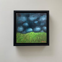 Simple green field with clouds painting