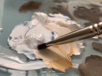 Painting flowers in a forest