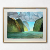 Framed shadow box wall art with islands and clouds
